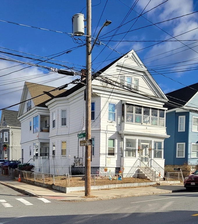 a view of a building with a street