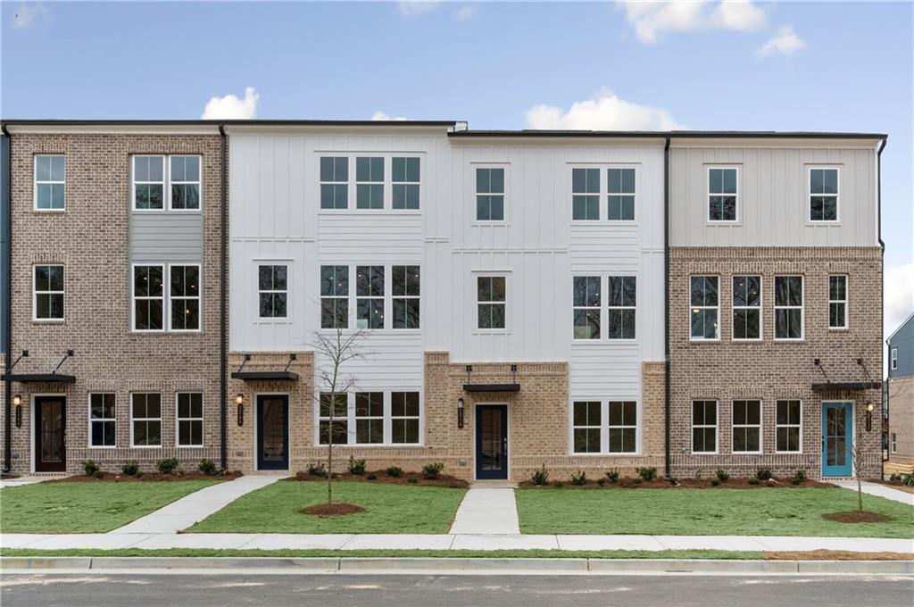 a front view of a building with yard