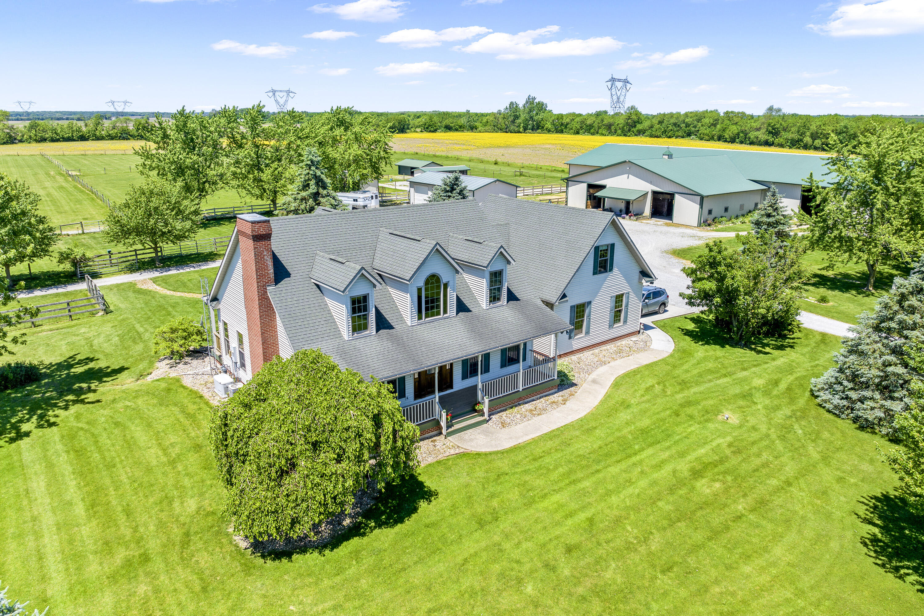 an aerial view of a house with outdoor space swimming pool and outdoor seating