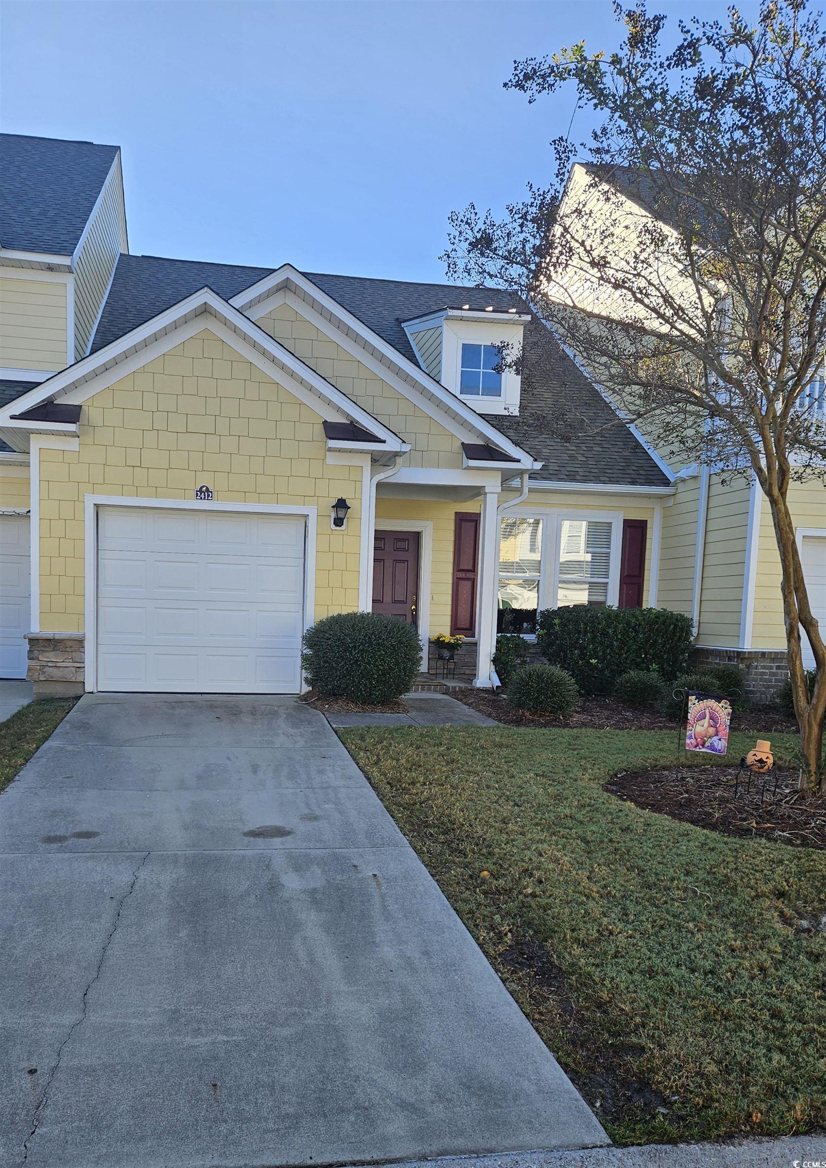 View of front of house featuring a front yard and