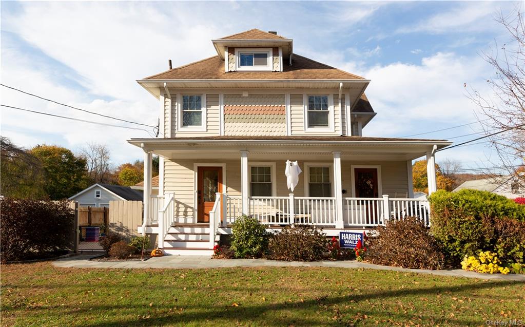 a front view of a house with a porch