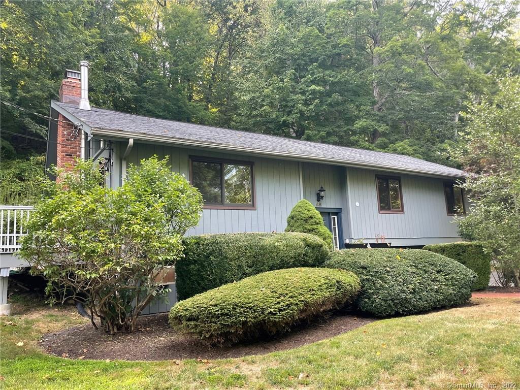 a view of a back yard of the house