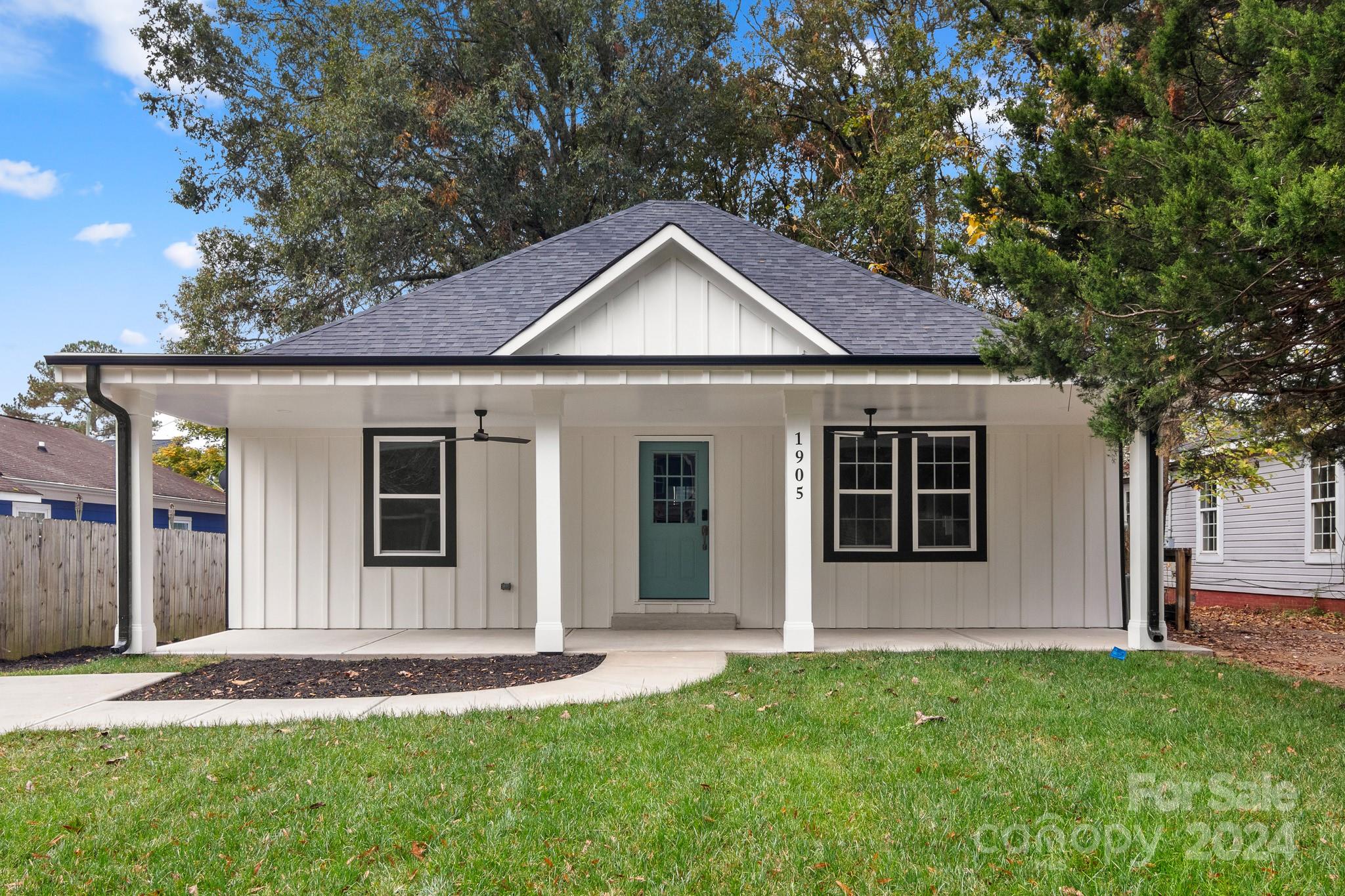 front view of a house with a yard