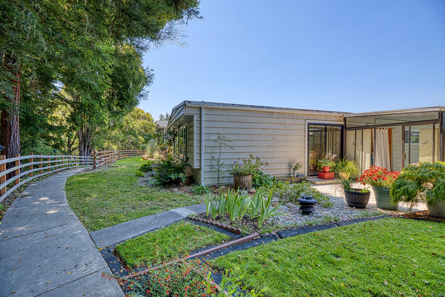 a backyard of a house with seating space