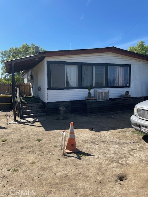 a view of a back yard of the house