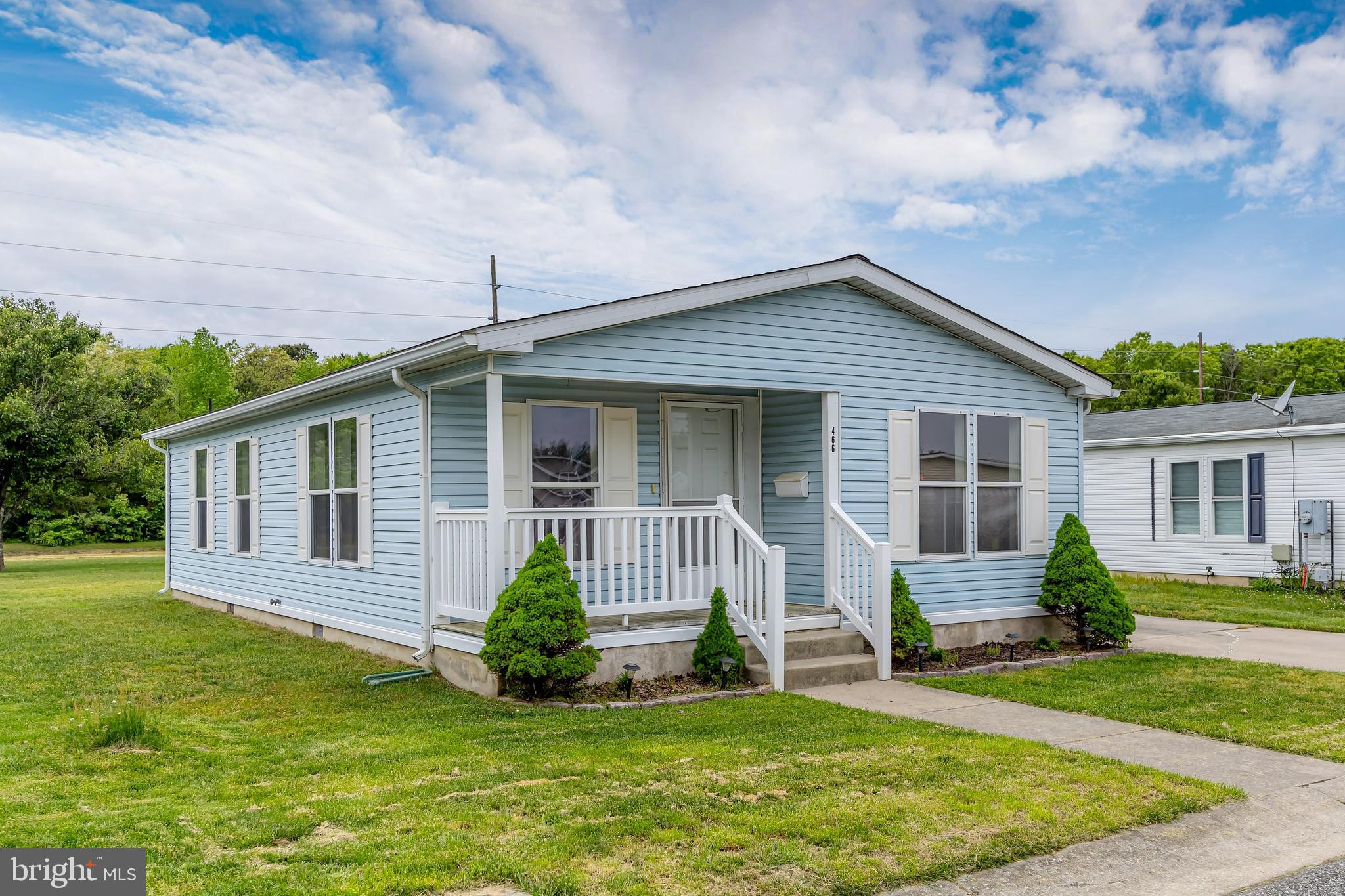 front view of a house and a yard