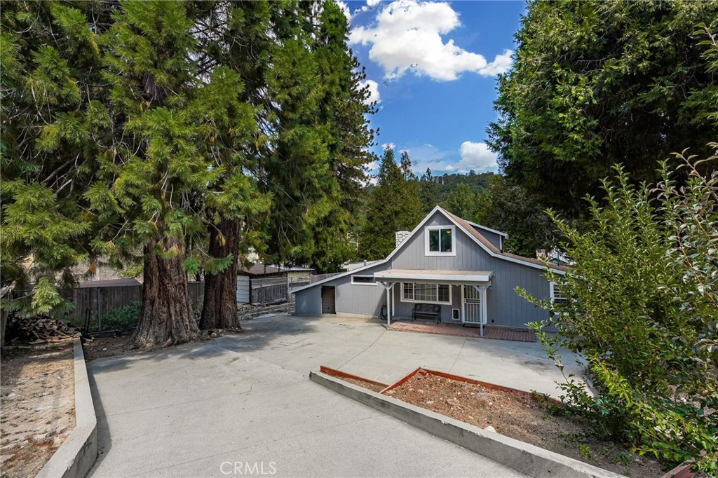 a house with trees in the background