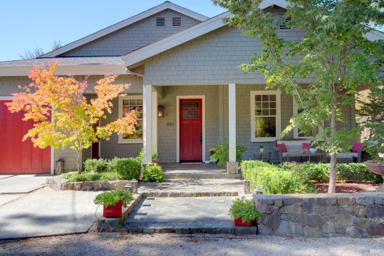 a front view of a house having garden