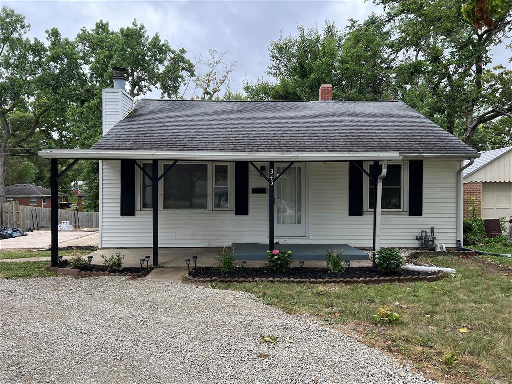 a front view of a house with yard