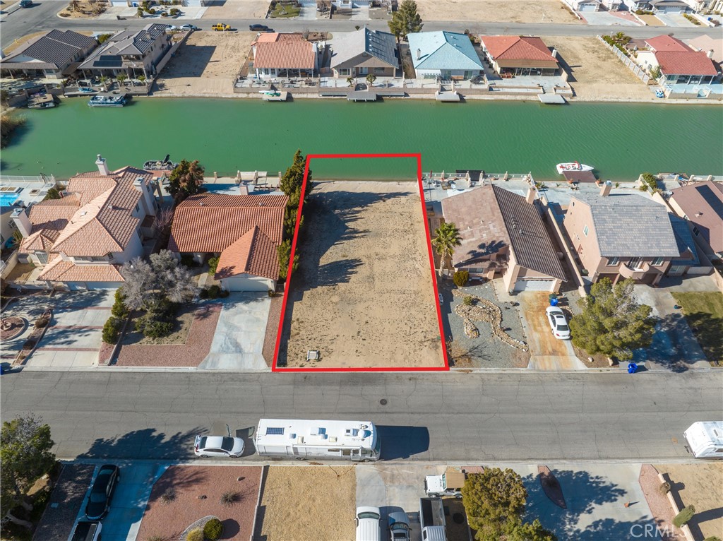 an aerial view of a houses with outdoor space