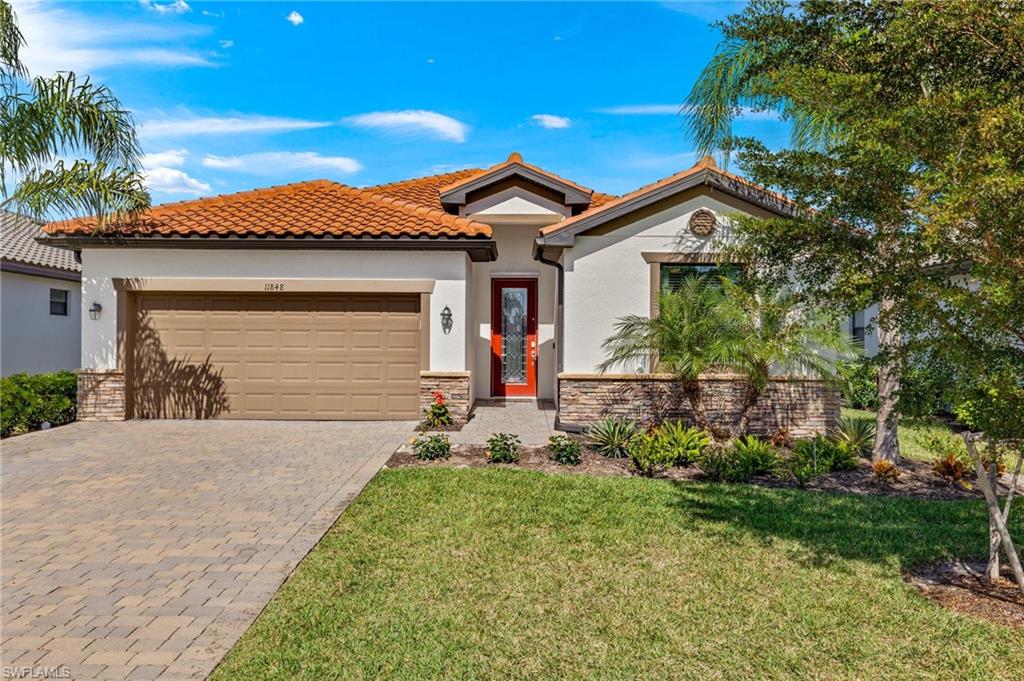 front view of a house with a yard