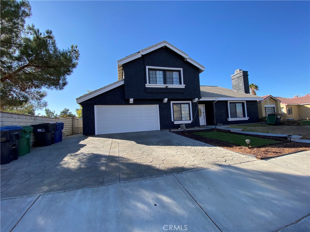 a front view of a house with yard