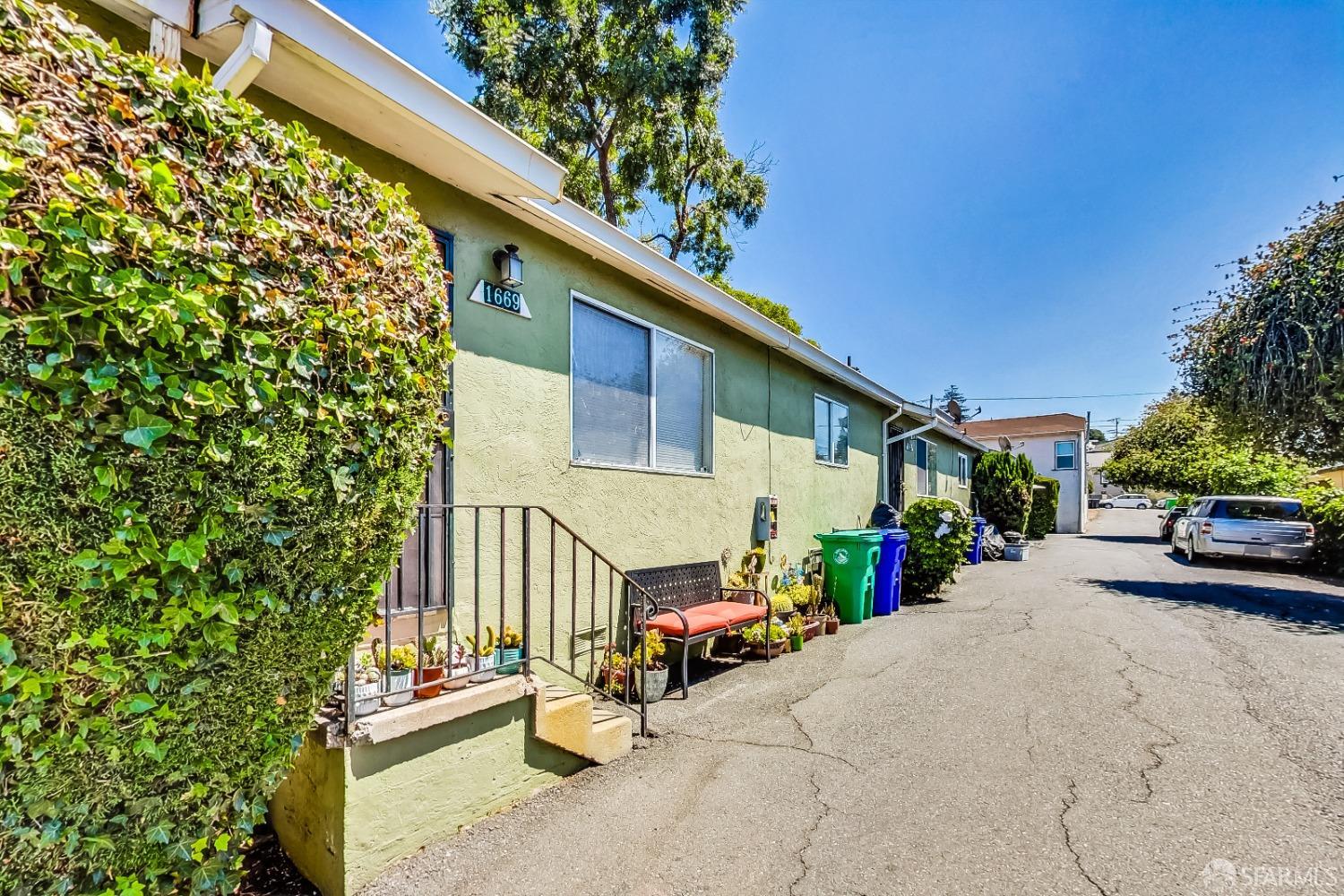 a view of car parked front of house