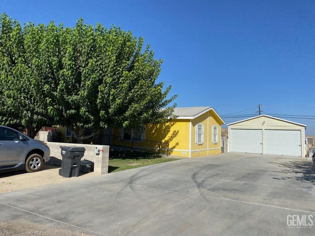 a view of backyard of a house