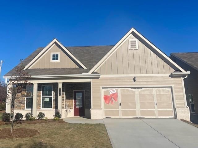 a front view of a house with a garage