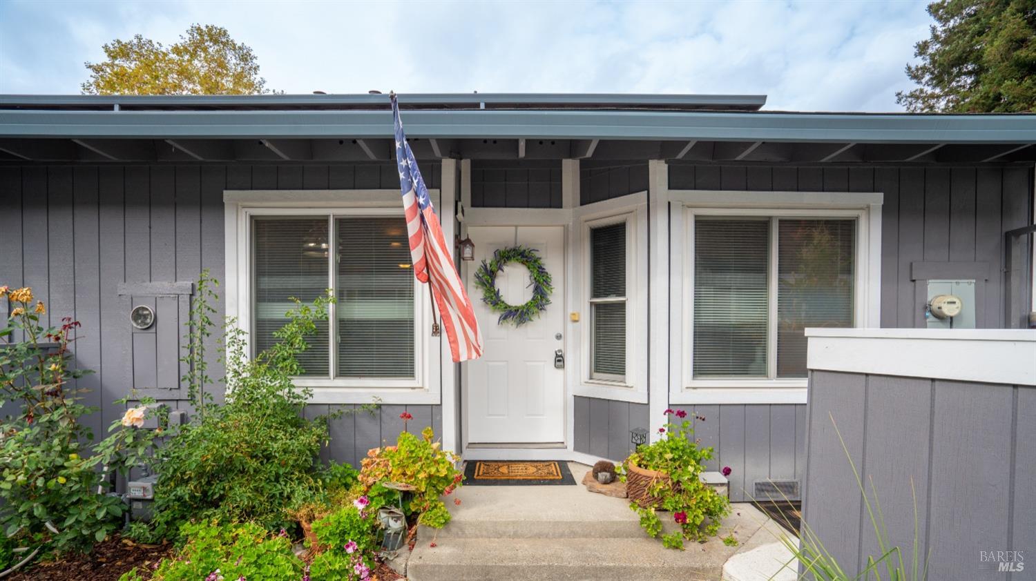 a front view of a house with a porch