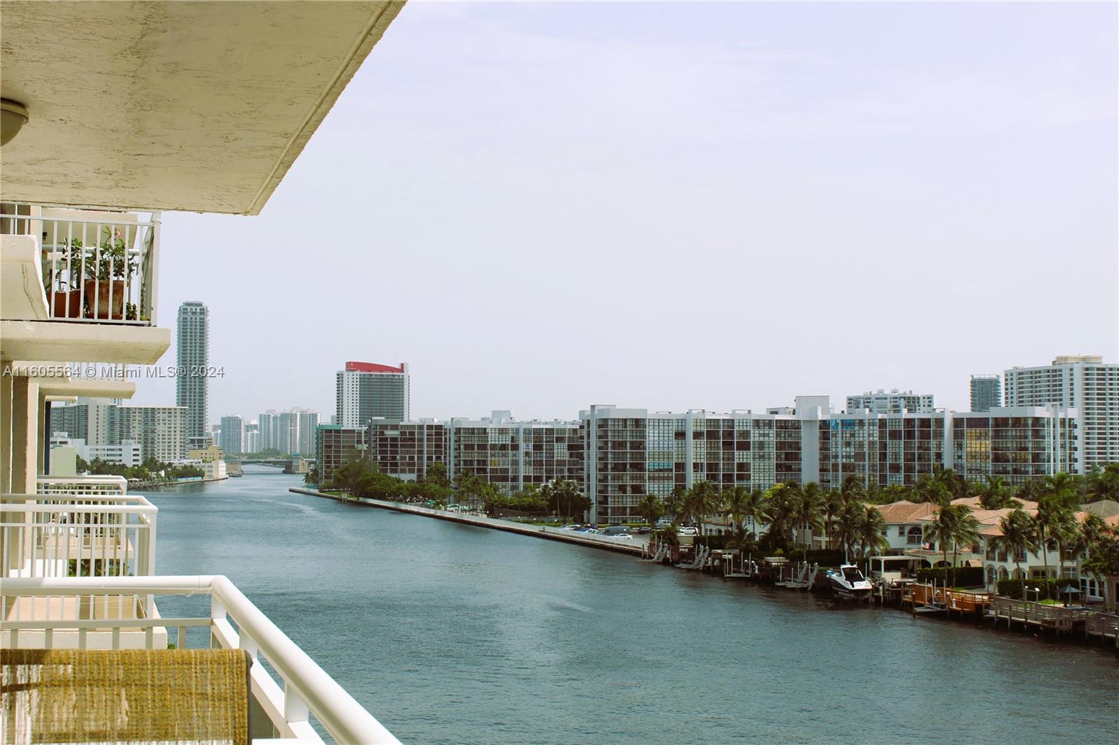 a view of a balcony with city