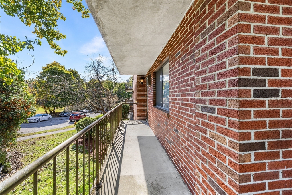 a view of a balcony with an outdoor space