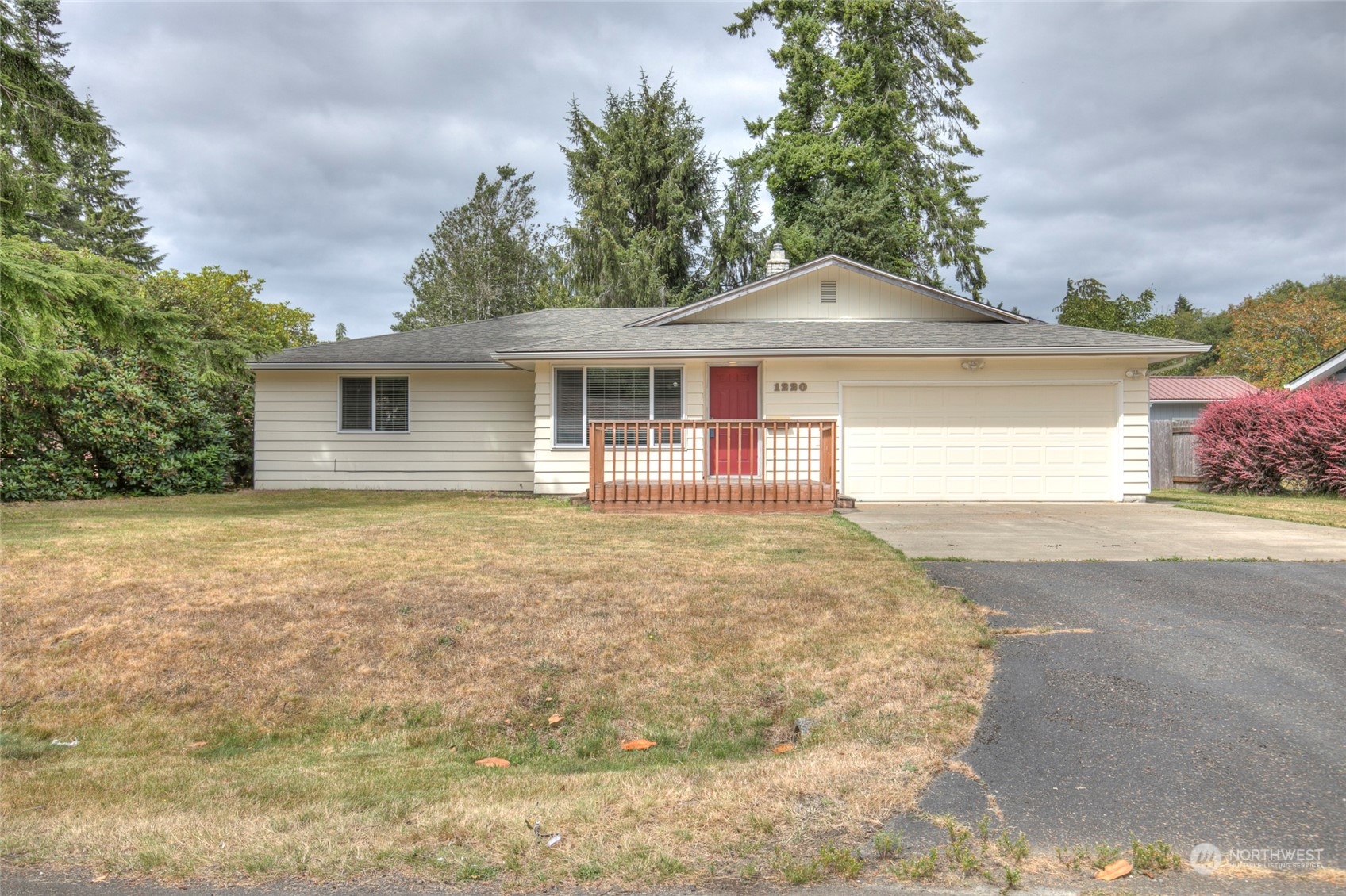 a front view of a house with yard