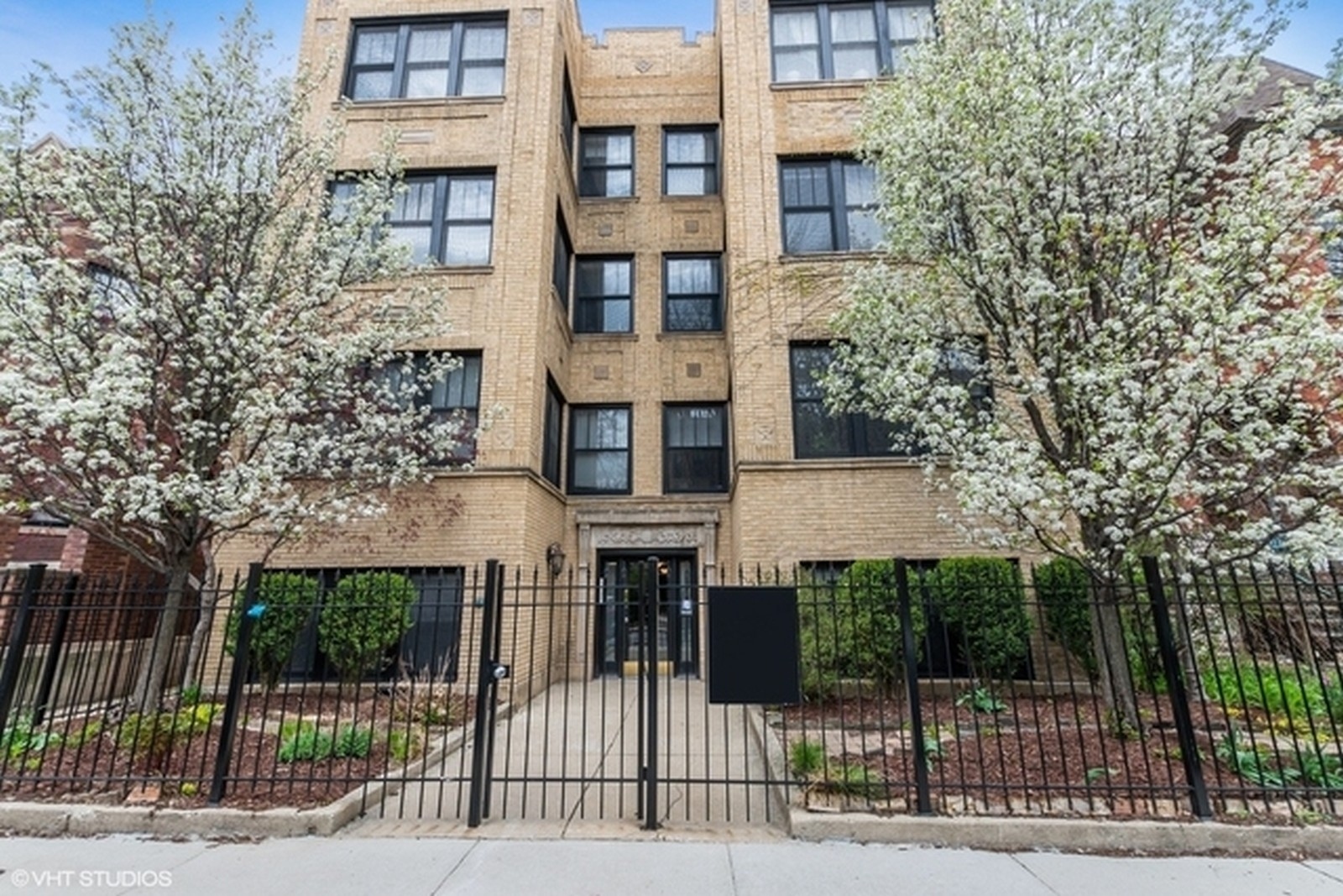 a view of a building with a tree