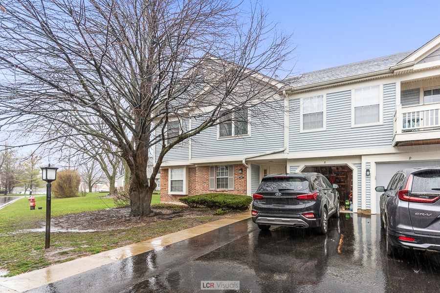 a car parked in front of a house