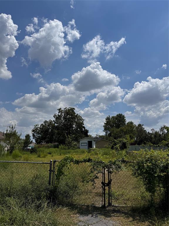 a view of a lake with a yard