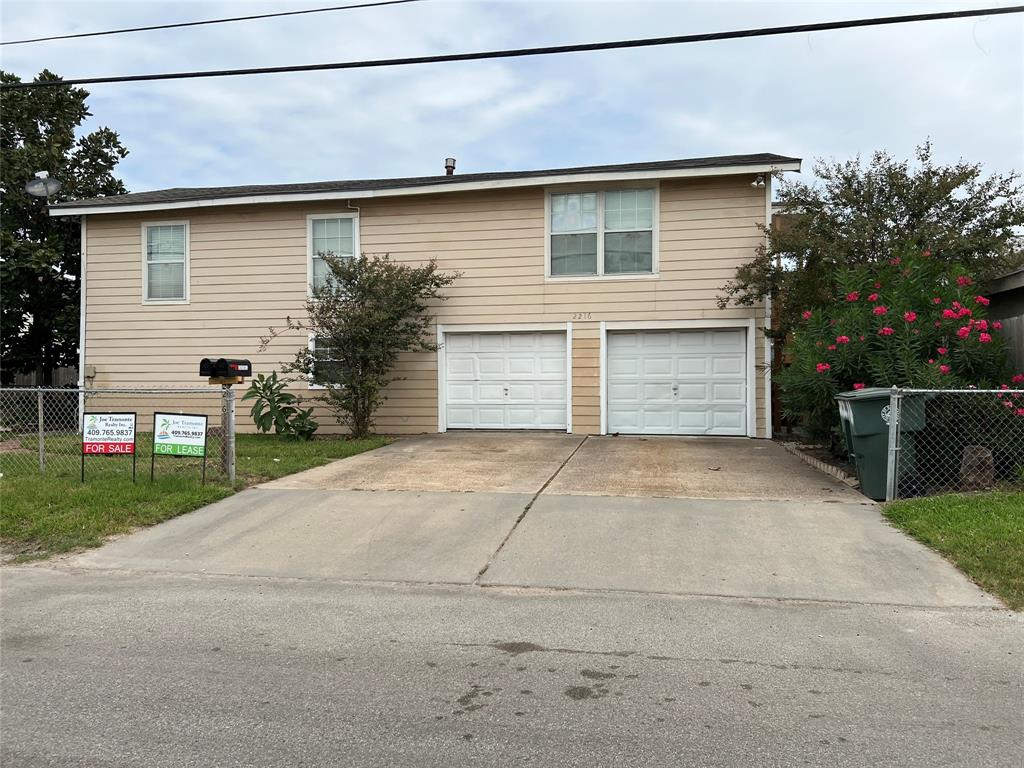 a front view of house with garage