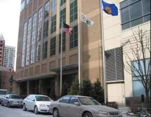 a view of a car parked in front of a building