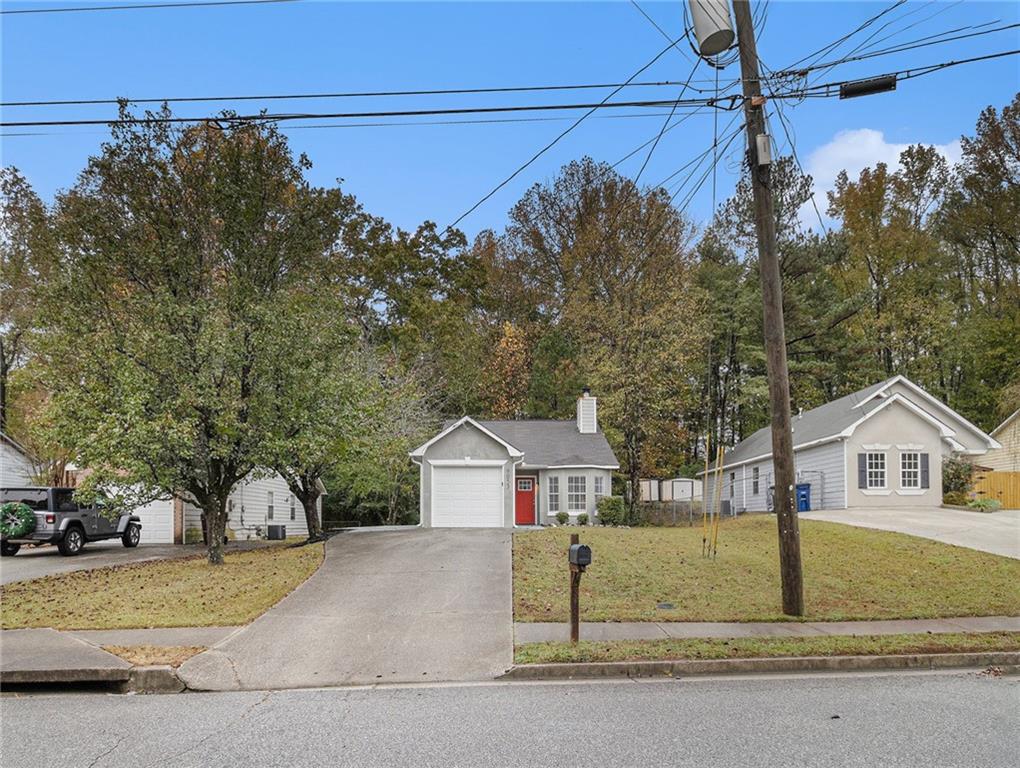 a house with trees in the background