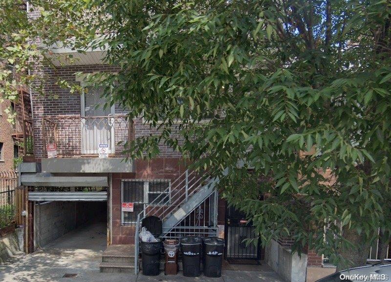 a view of house with outdoor space and deck