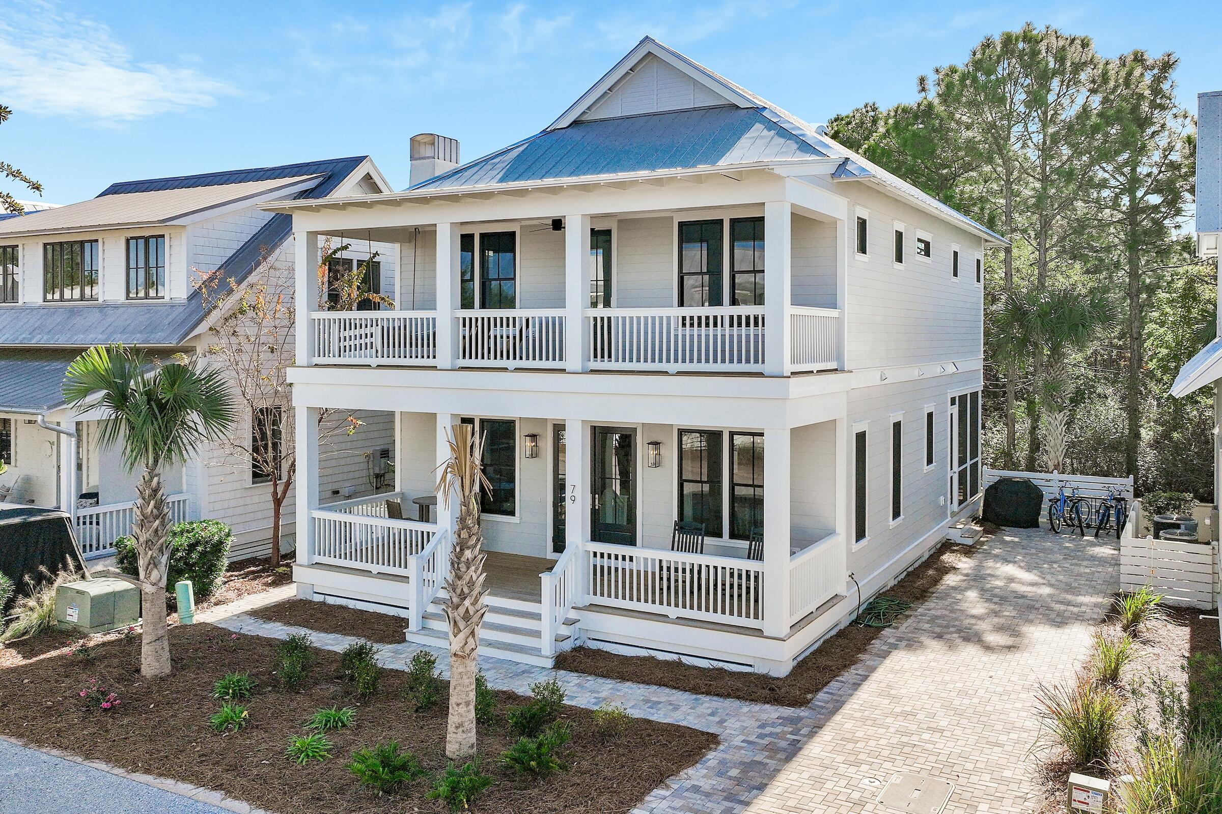 a front view of a house with a porch