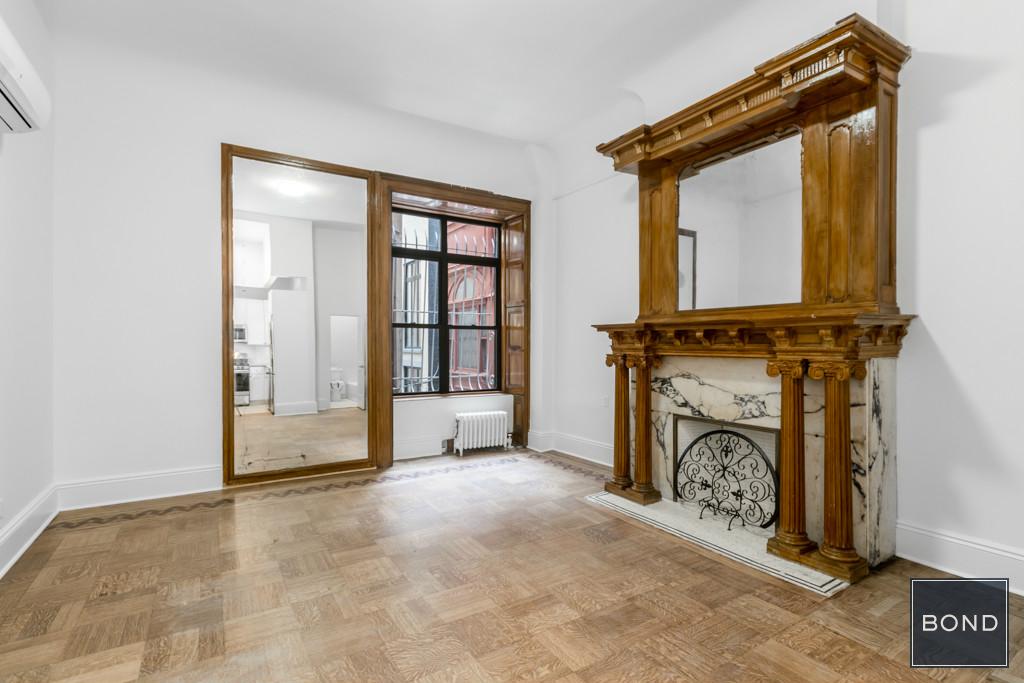 a view of a livingroom with a fireplace