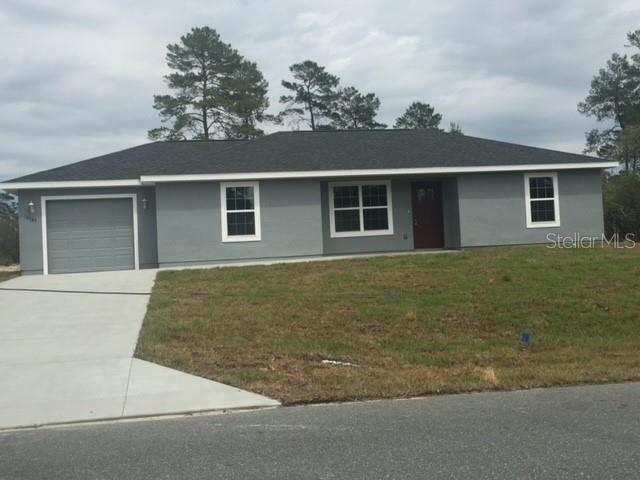 front view of house with a yard