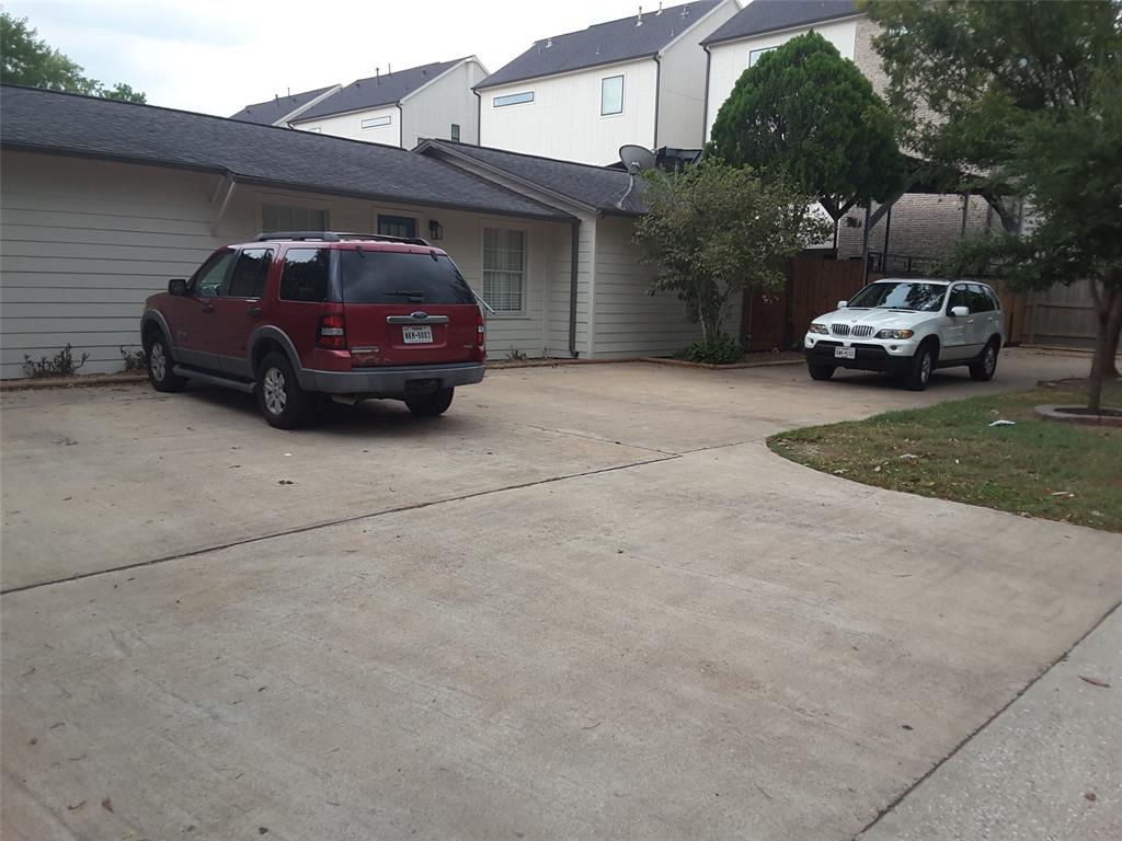 a car parked in front of a house