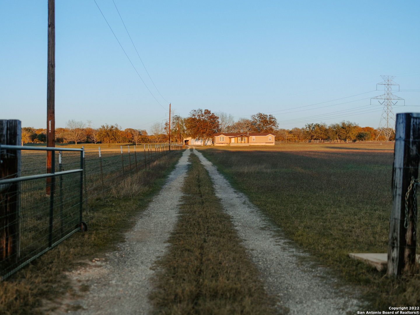 a view of a lake with a yard