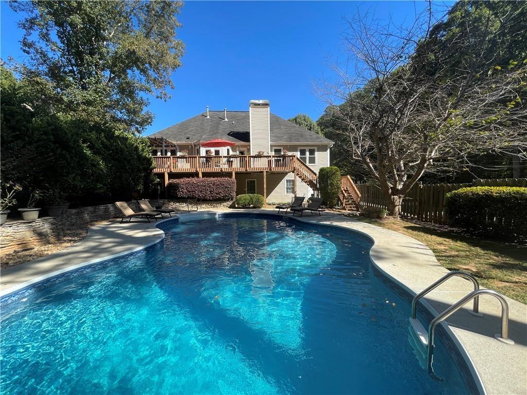 a view of a house with swimming pool