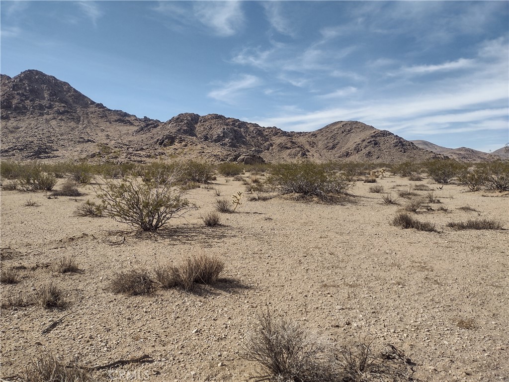 a view of mountains and valleys