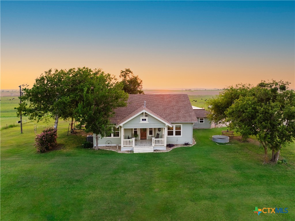 a view of house with garden