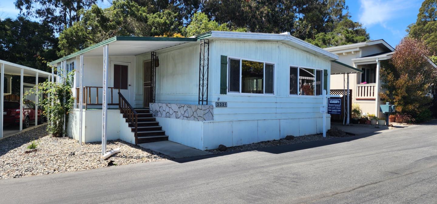 a front view of a house with a garage