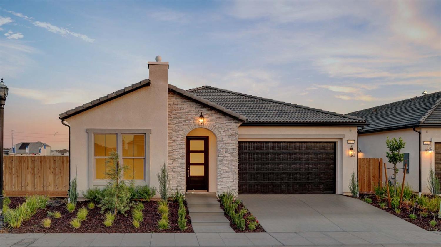 a front view of a house having yard