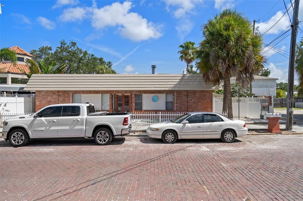 a car parked in front of a house