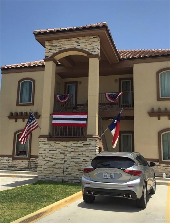 a car parked in front of a house