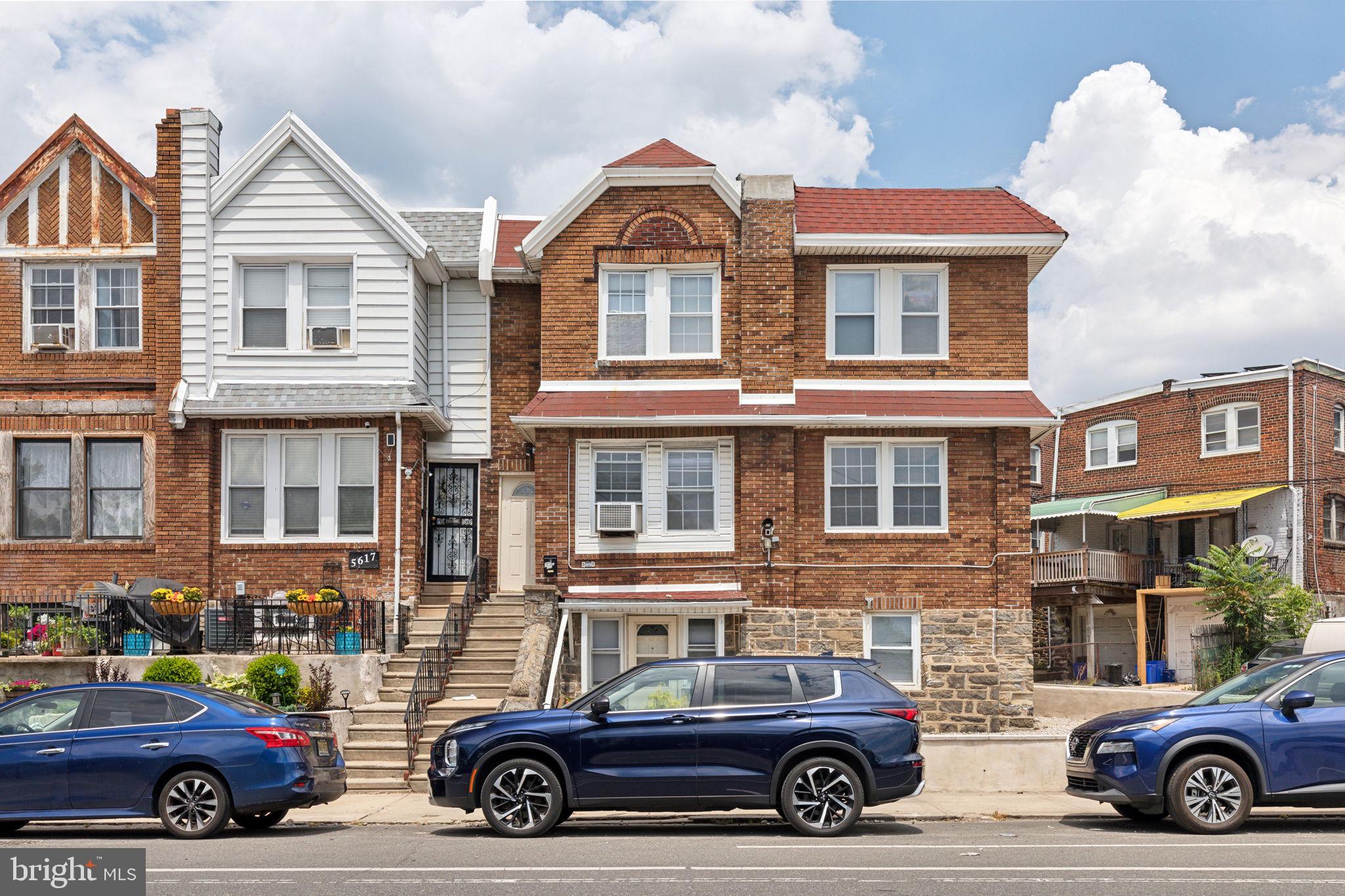 a car parked in front of a house