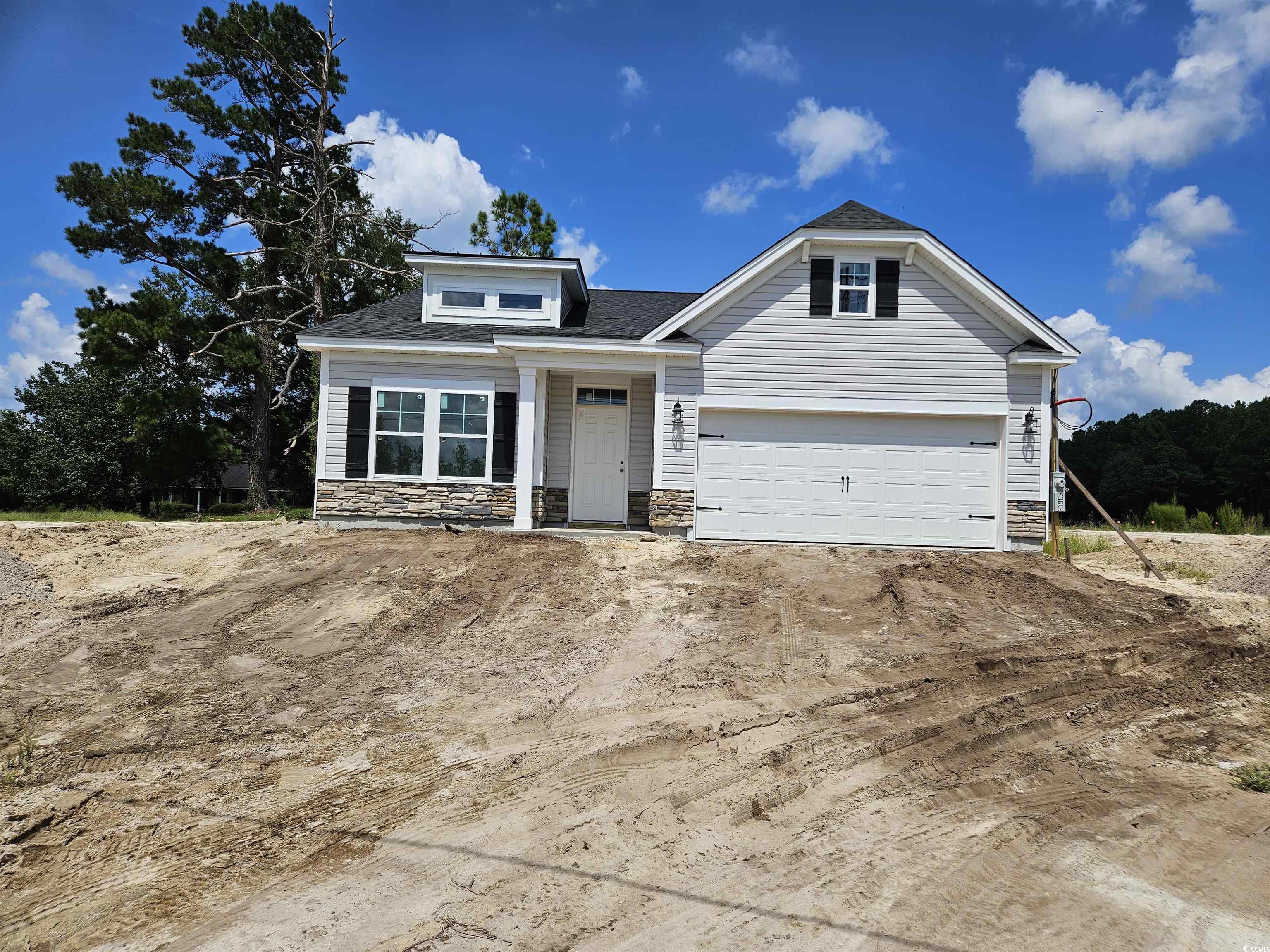 Craftsman house with a garage