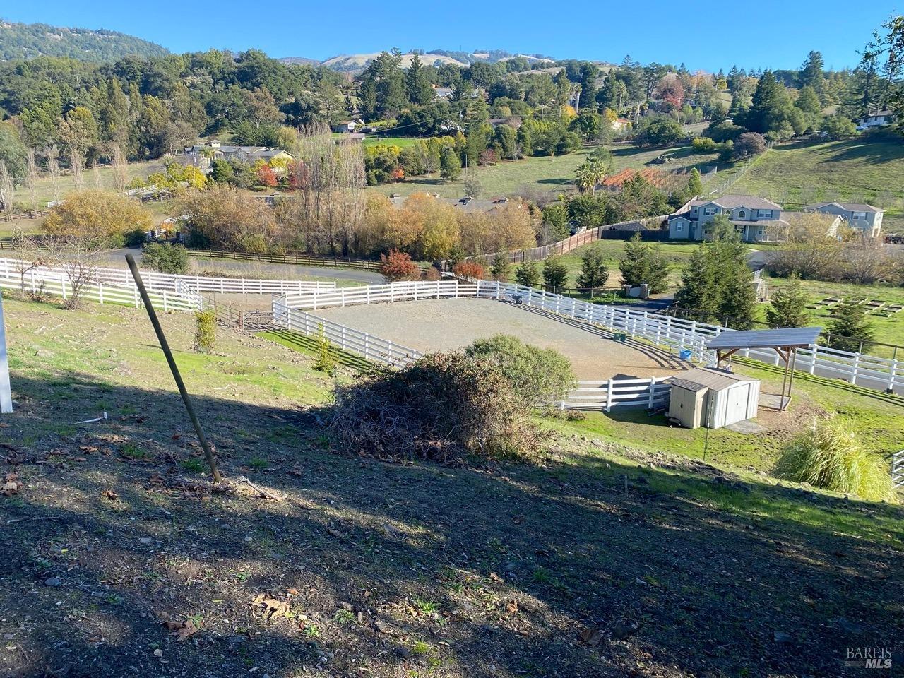 a view of a lake with a yard