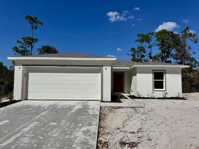 a view of a house with a garage