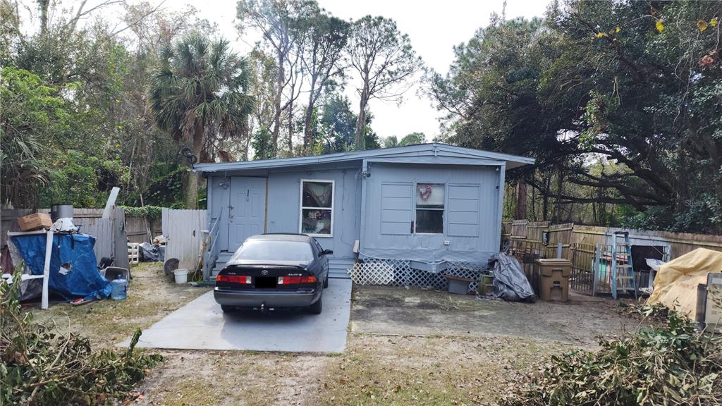 a car parked in front of a house