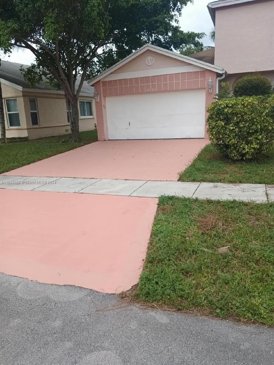 front view of house with a yard