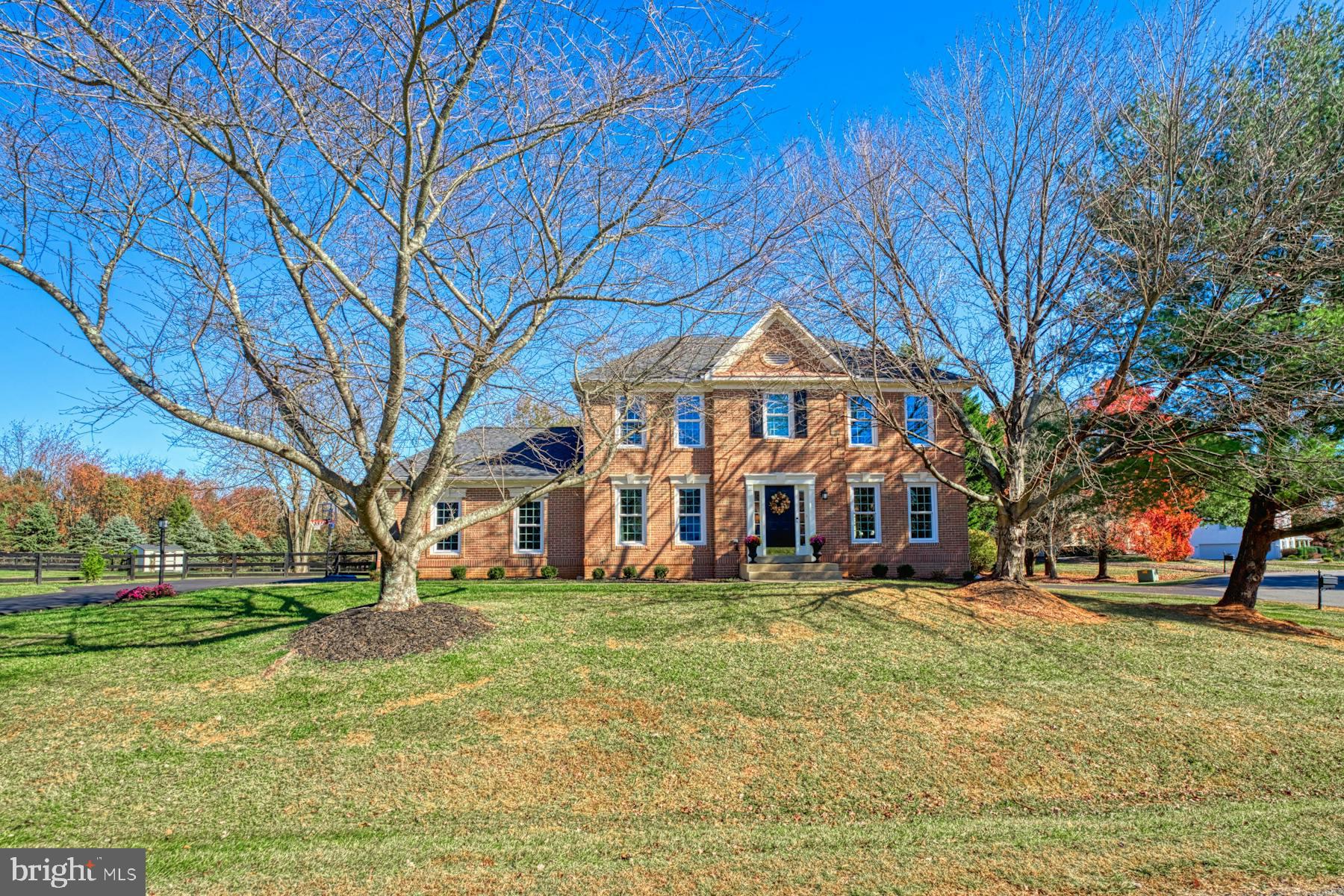 a large building with trees in front of it