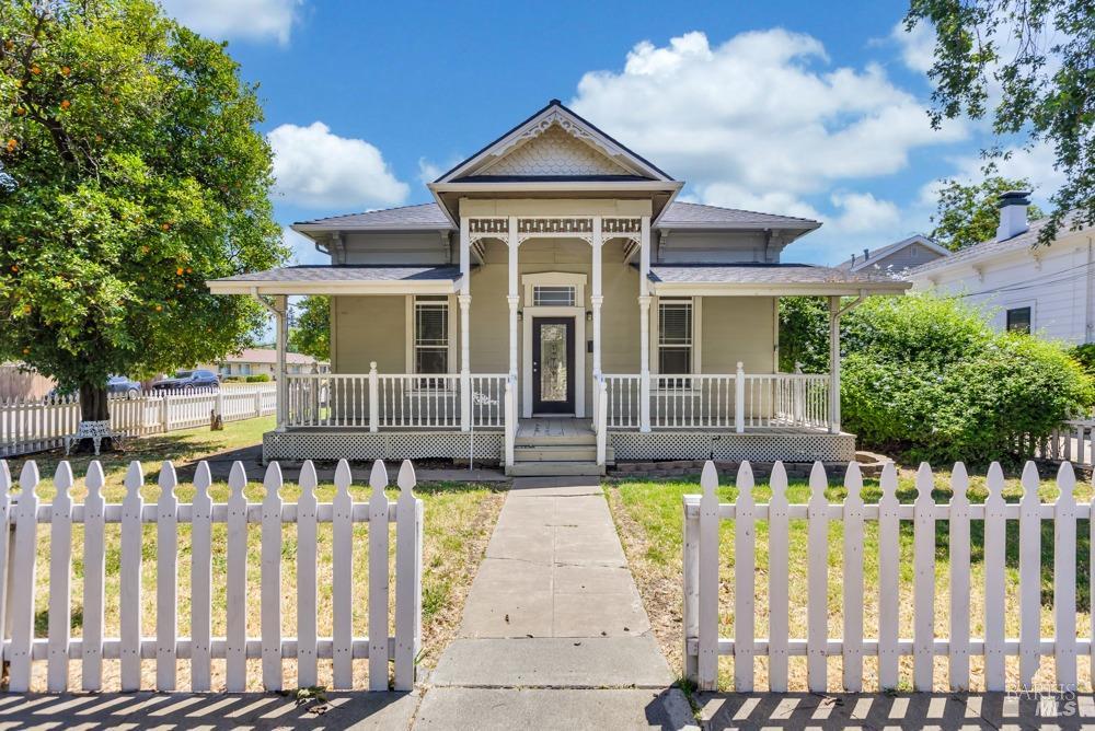 a front view of a house with a porch